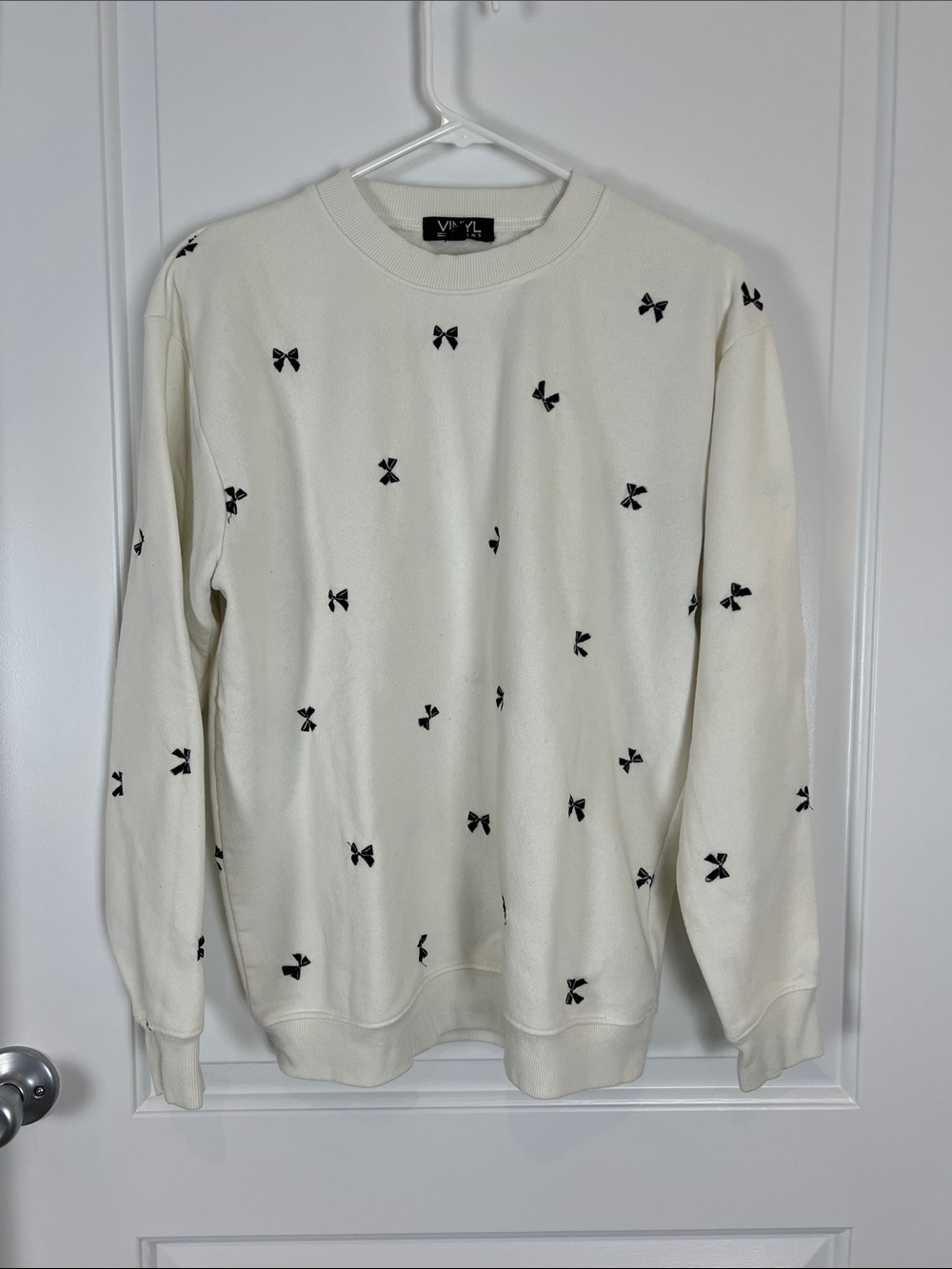 VPL Cream Crewneck Sweater with Black Bow Accents